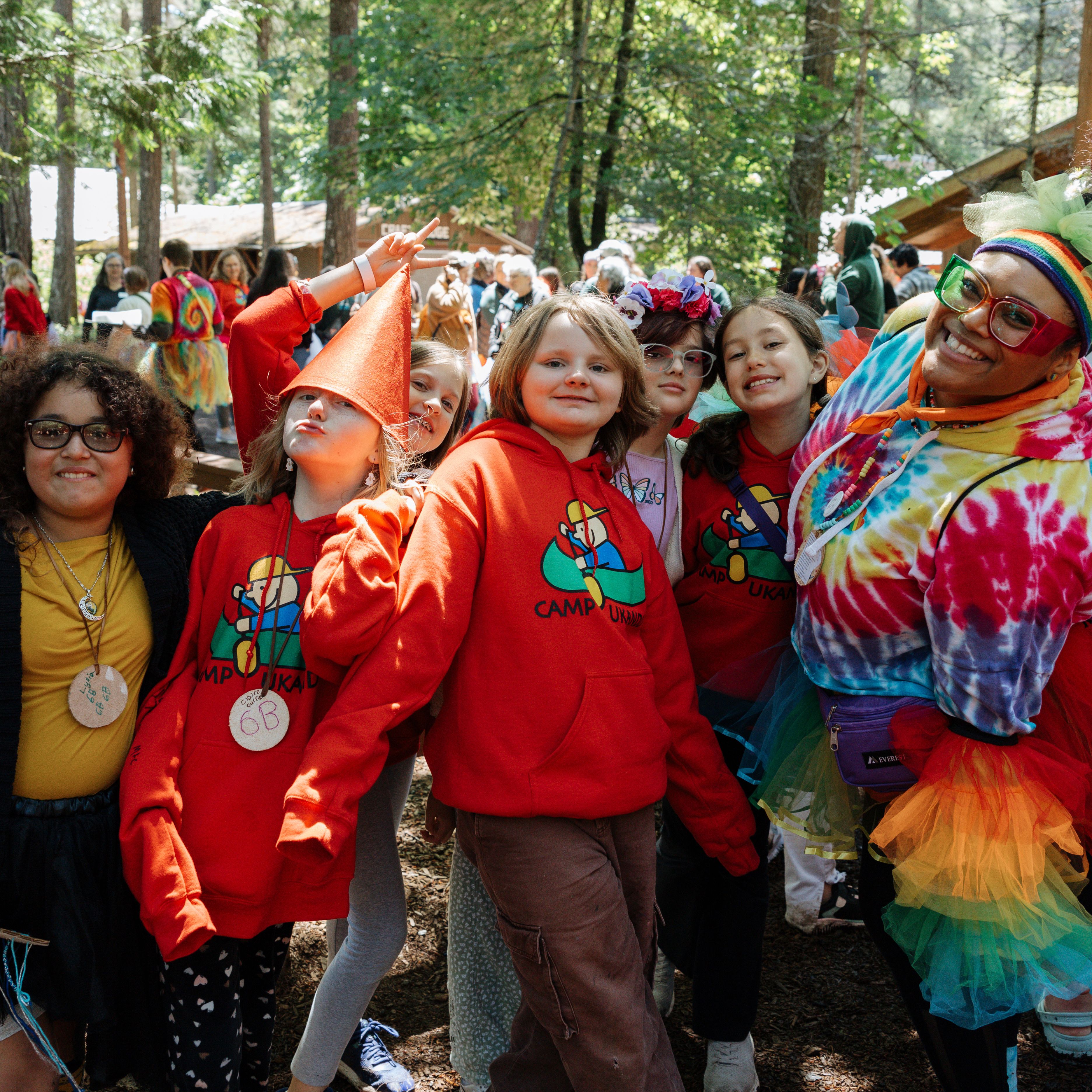 Camp counselor and six young campers